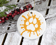 Load image into Gallery viewer, FurAffinity Paw Print Splat 3in Ceramic Ornament - Fur Affinity Merch Shop
